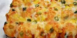 طرز تهیه نان پنیری خوشمزه و مخصوص به صورت پیتزایی