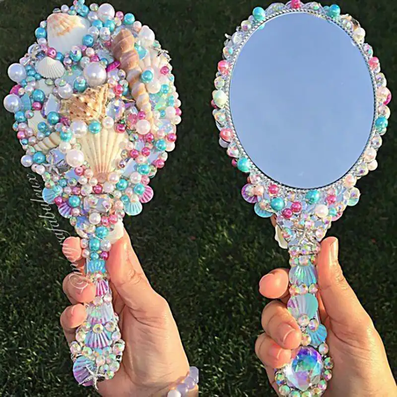 آینه تزئین شده با صدف و گوش ماهی