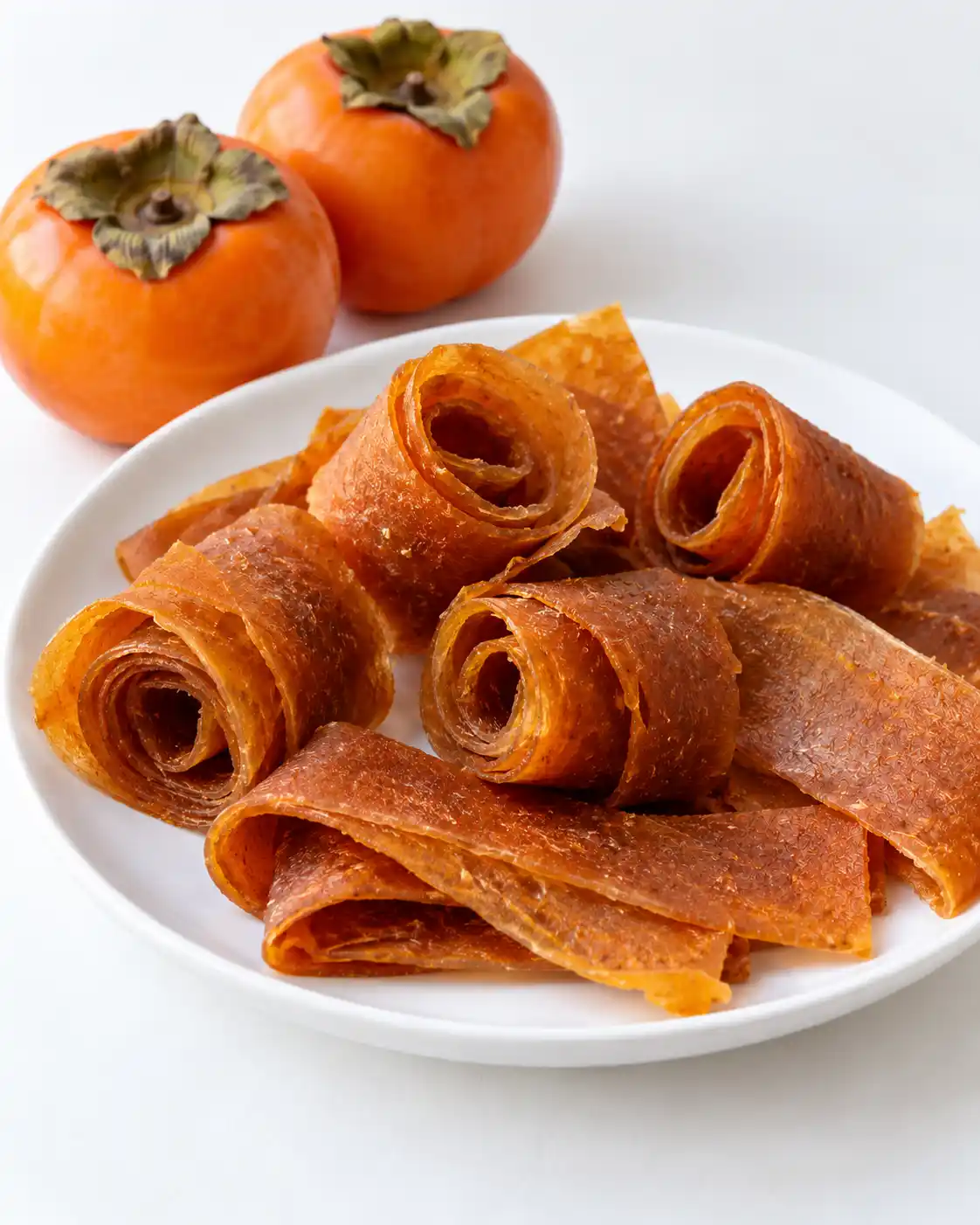 طرز تهیه لواشک خرمالو با میوه رسیده و بدون پخت اولیه